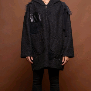 Oversized black jacket with hood, sequin appliqué and fringe details
