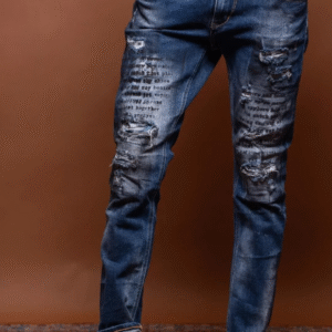 Men's denim jeans with graphic text details.