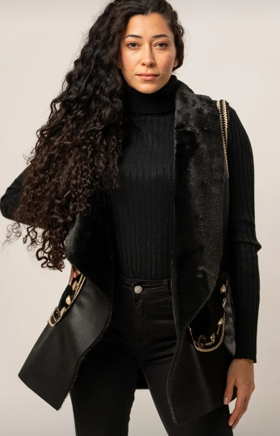 Elegant black faux fur vest