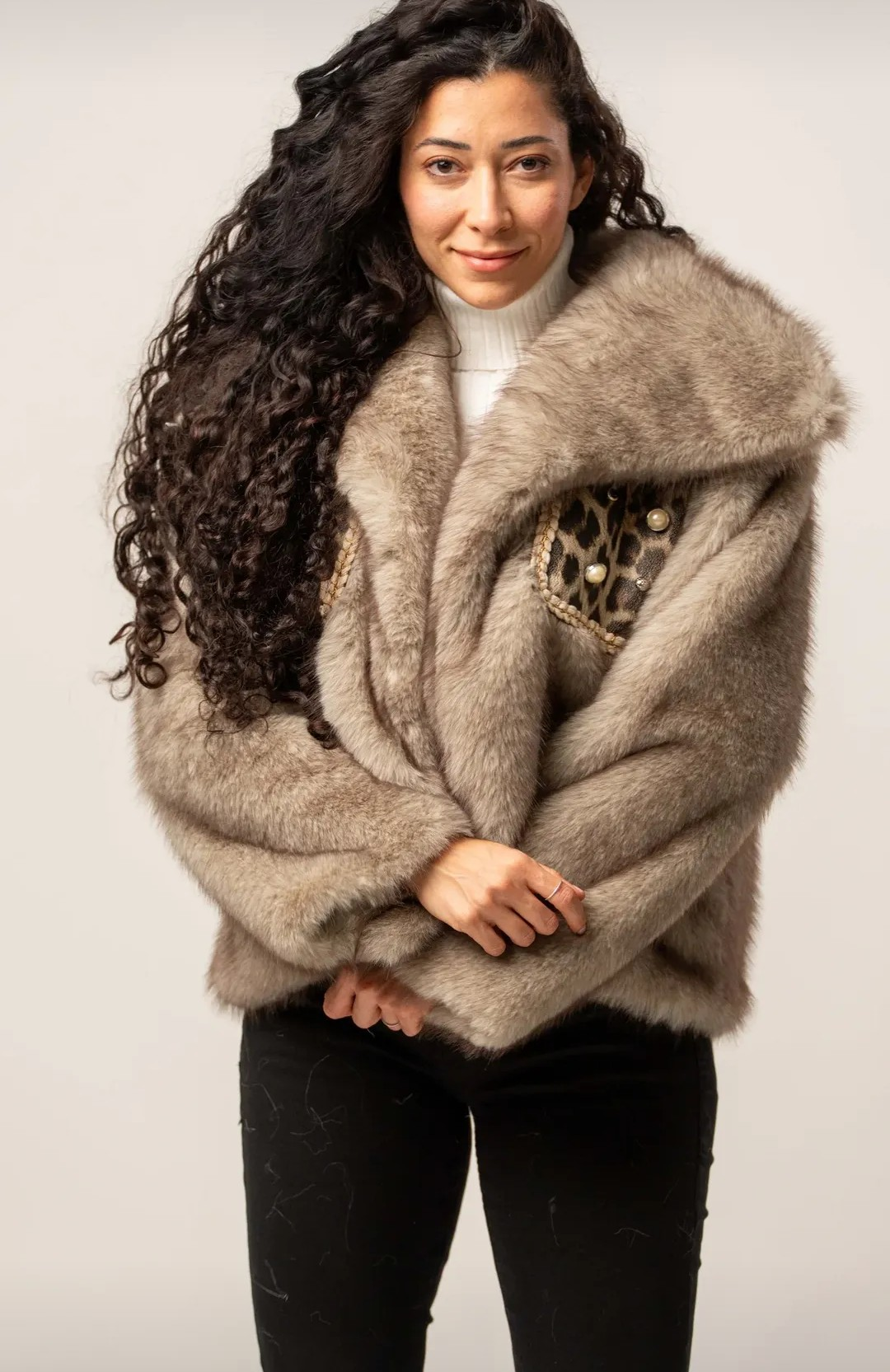 Faux fur coat with animal print pockets